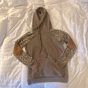 Cable knit animal sleeve sweater